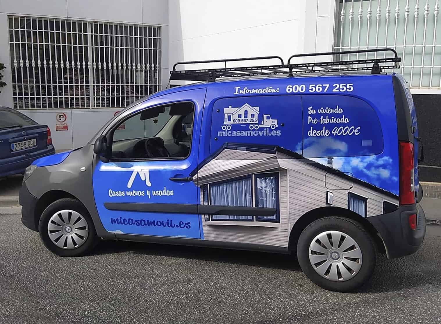 Vehicle vinyl graphics design for micasamovil.es mobile homes company.