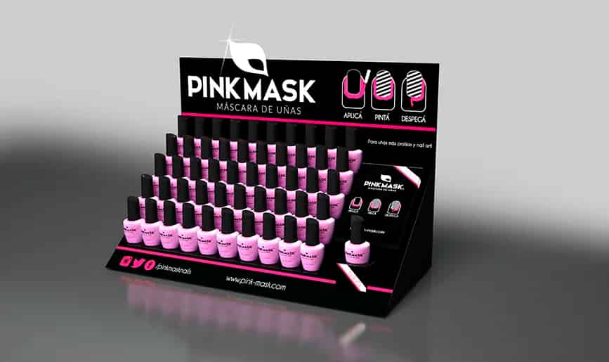 Pinkmask retail display featuring tiered black acrylic merchandising unit with pink nail mask bottles organized in rows, including branded header with usage instructions and website information.