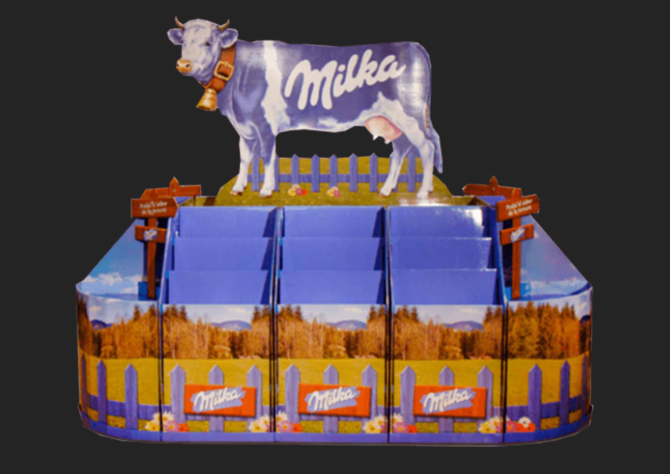 Milka retail display prototype featuring distinctive purple branding and curved structural design showcasing various Milka chocolate products.